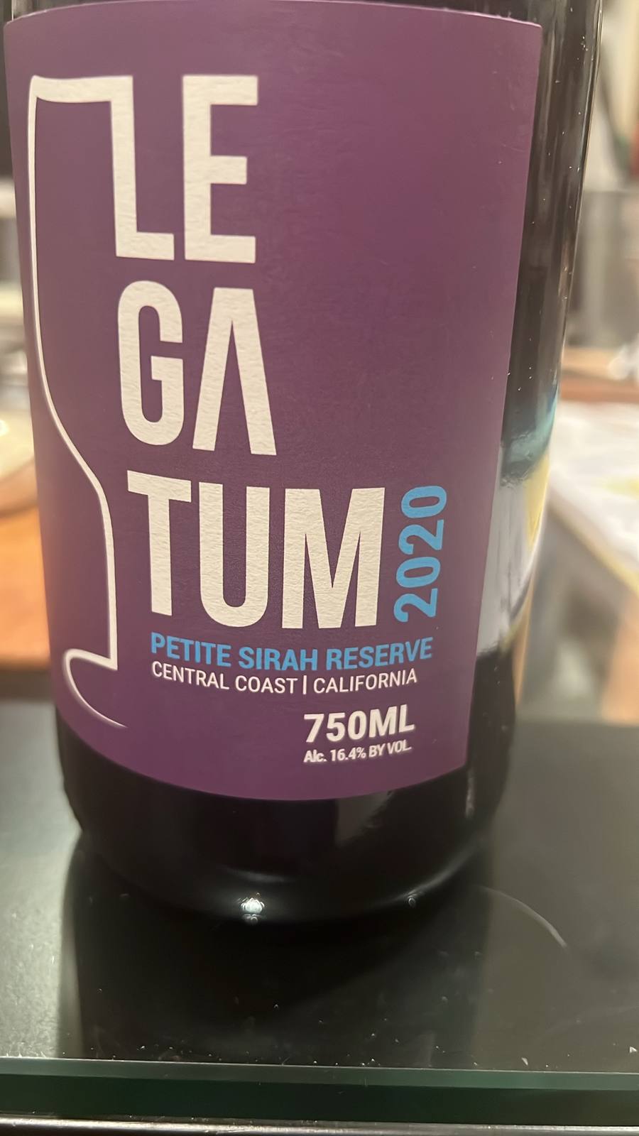 Purple front label of the Legatum 2020 Petite Sirah Reserve