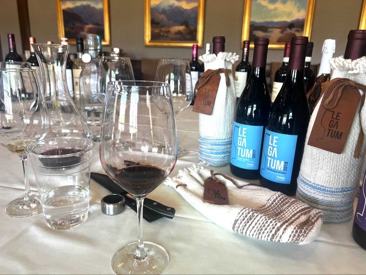 Blue-label 2017 and 2018 Malbec Reserves with their hand-woven sleeves